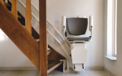automatic stairlift on staircase for elderly or disability in a house,